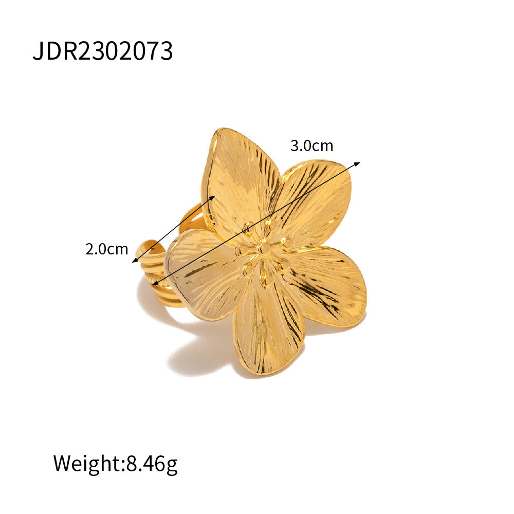 Paisley four-petal flowers ring